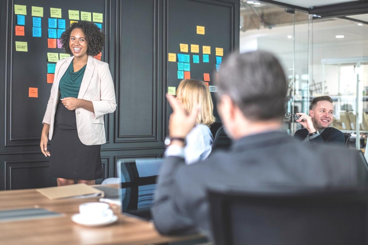 Professional budget planning session with charts and documents